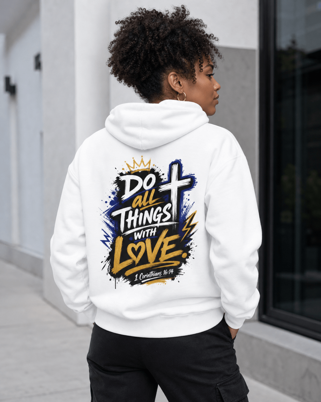 White hoodie with centered back graphic: crown, cross, and heart