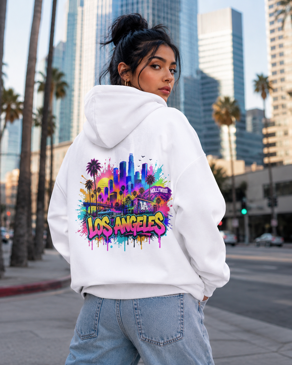 White hoodie with colorful graffiti skyline back print, side view
