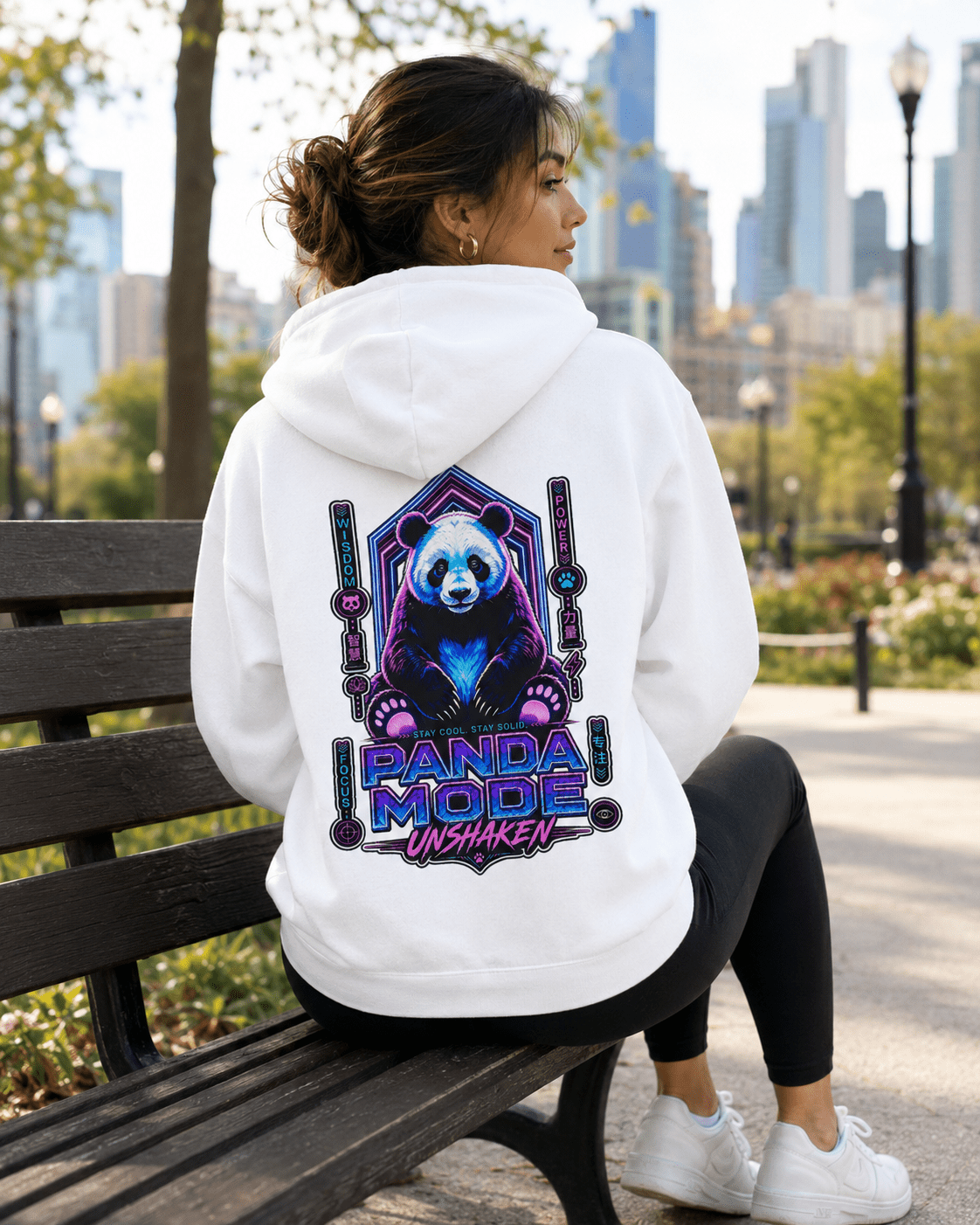 White hoodie back view on woman, panda logo graphic on hooded sweatshirt