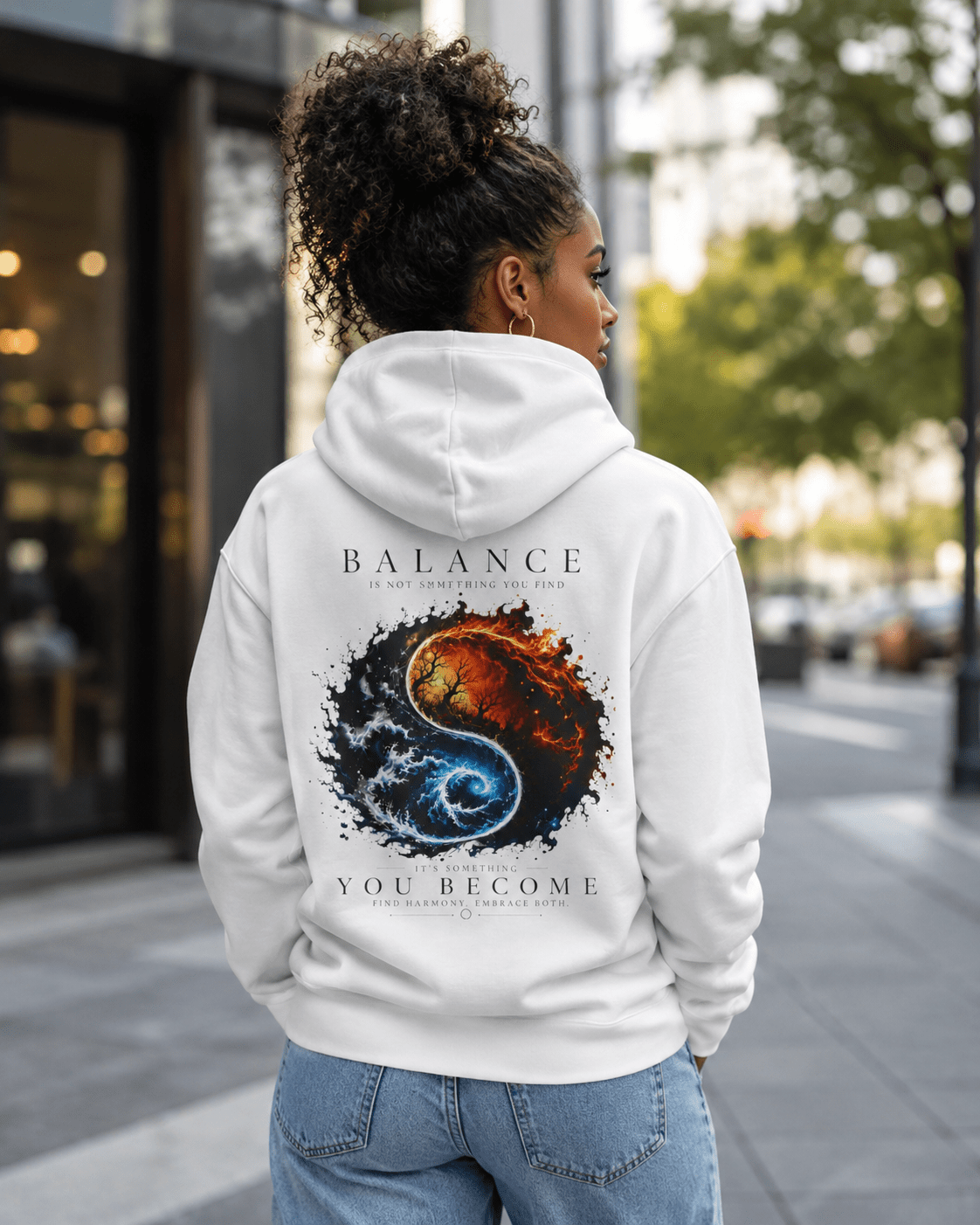 White hoodie on person, back graphic print and pullover hood