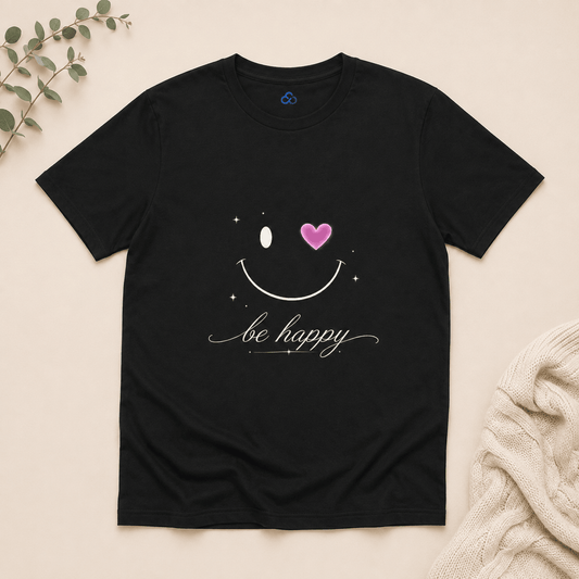 Black T-shirt with smiling face graphic, pink heart and 'be happy' script