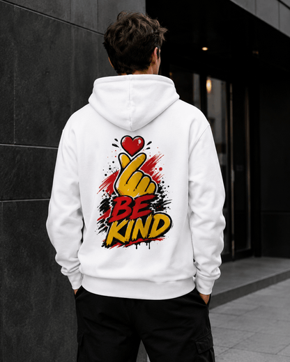 White hoodie worn from behind with 'Be Kind' heart-and-hand graphic