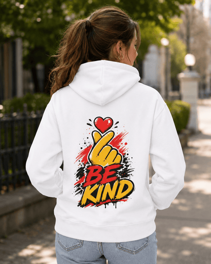 White hoodie worn from behind with 'Be Kind' heart-and-hand graphic, close view
