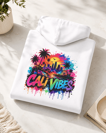 Folded white hoodie with back “Cali Vibes” multicolor splash artwork