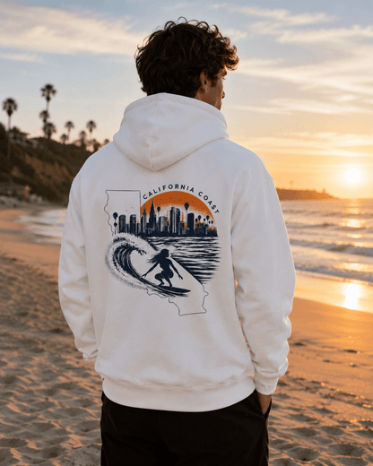 White hoodie worn from behind; California coast surf and city skyline graphic