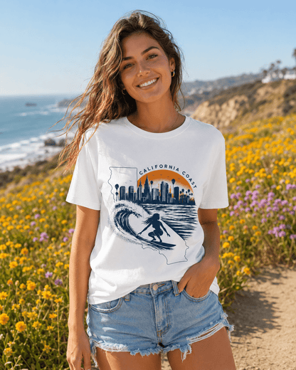 White T-shirt with California coast skyline and wave surfer graphic, worn outdoors