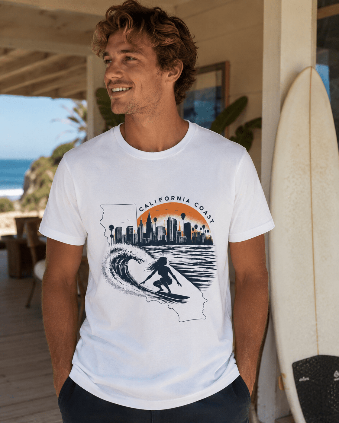 White T-shirt with California coast skyline and wave surf graphic, worn by a man