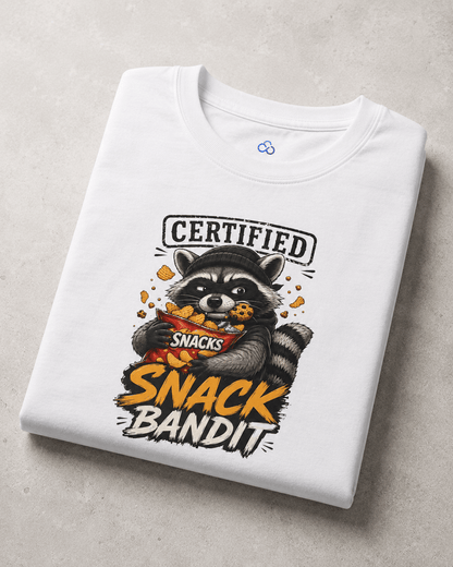 Folded white crew-neck T-shirt with raccoon 'Snack Bandit' front graphic print