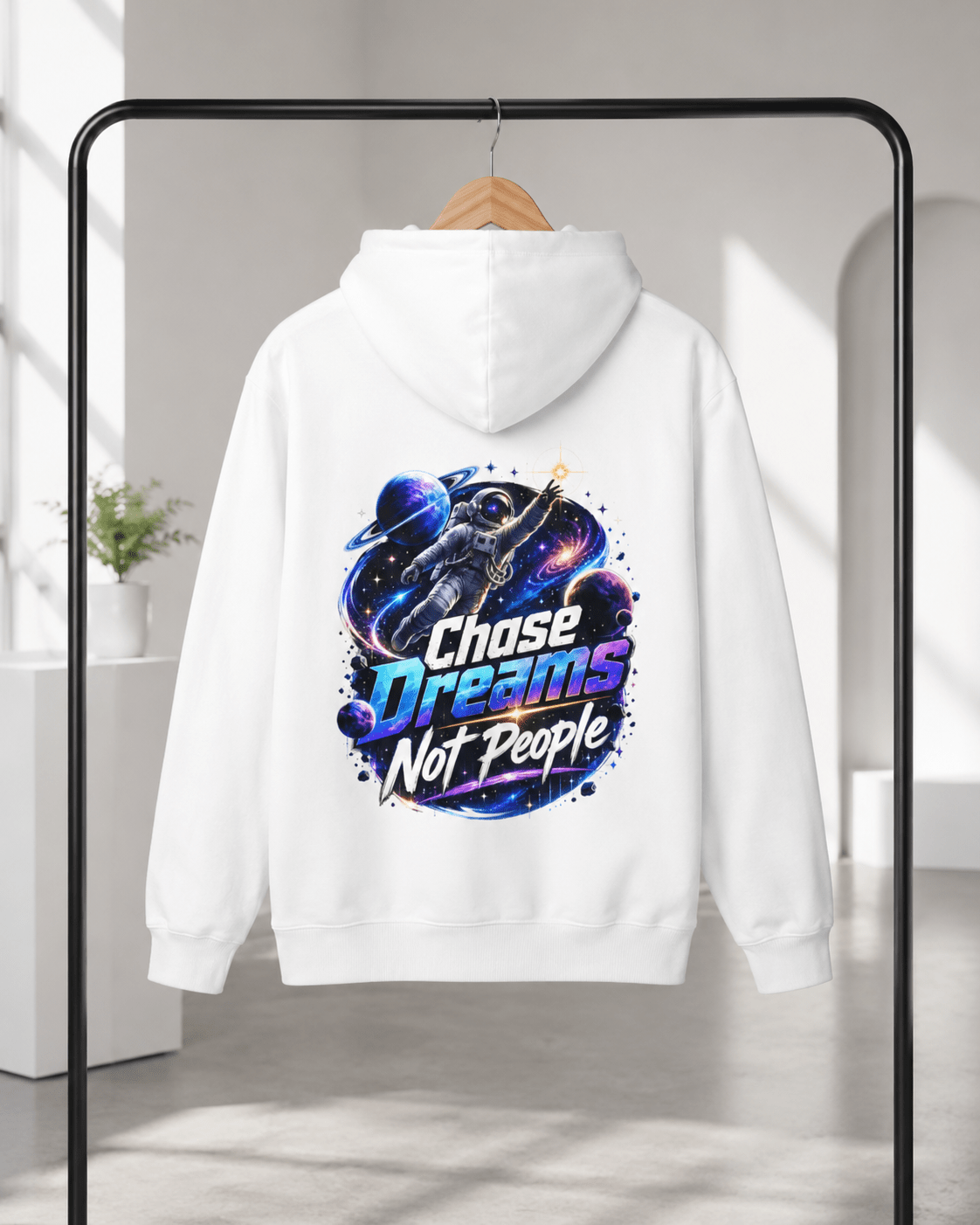 White hoodie hanging, back astronaut graphic and colorful text print