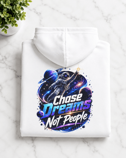 White pullover hoodie folded flat, back astronaut graphic and colorful text print
