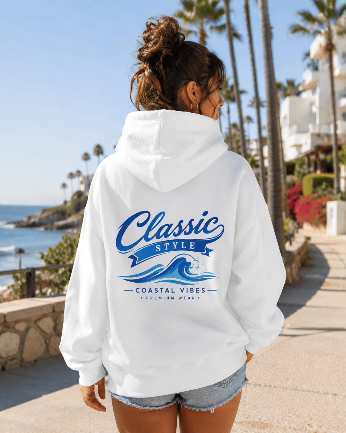 White hoodie worn from behind with blue graphic print on back