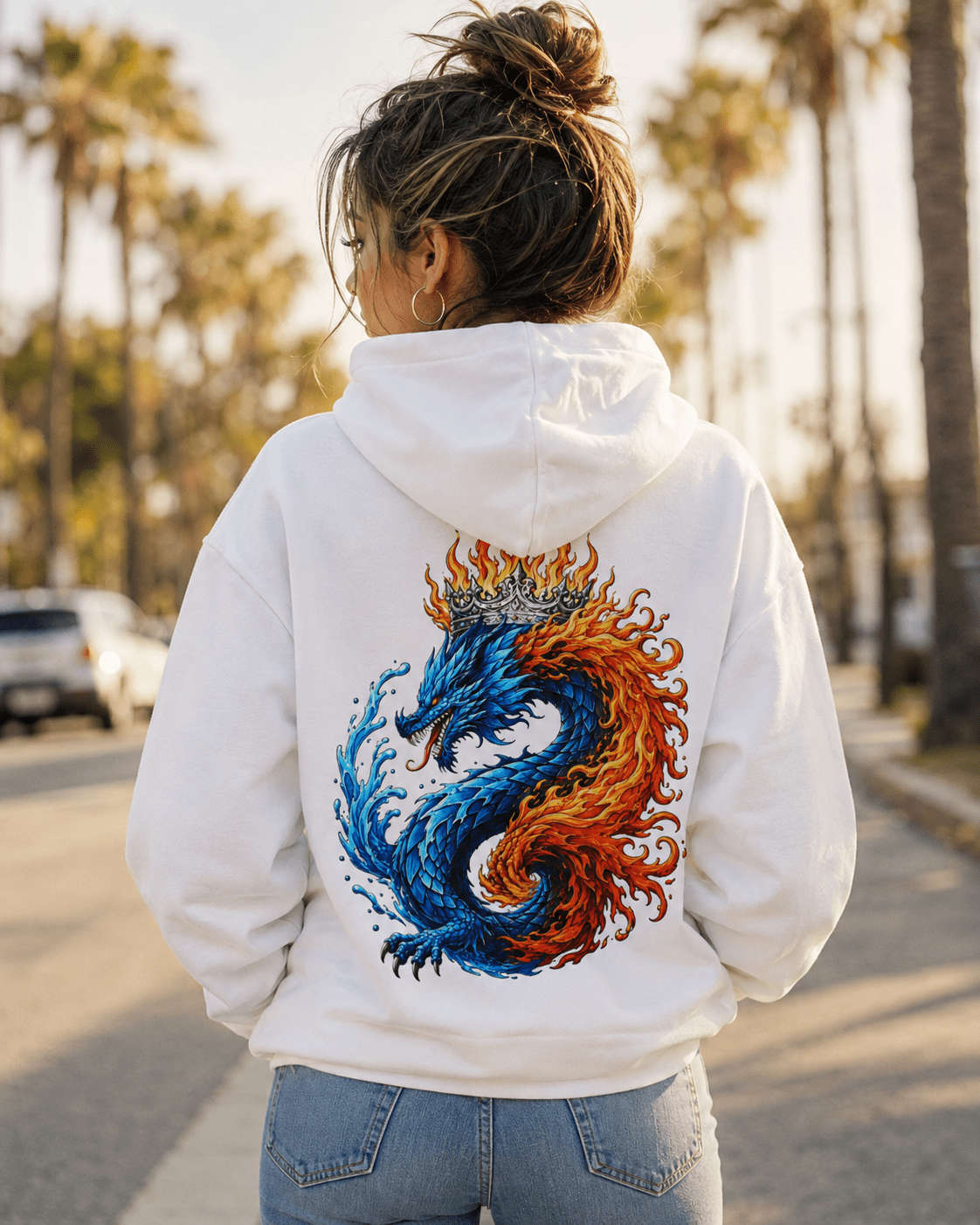 White hoodie with back dragon flame graphic, worn with blue jeans