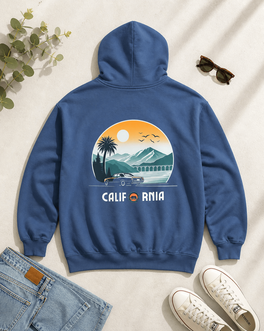 Blue hoodie with California graphic on a light background