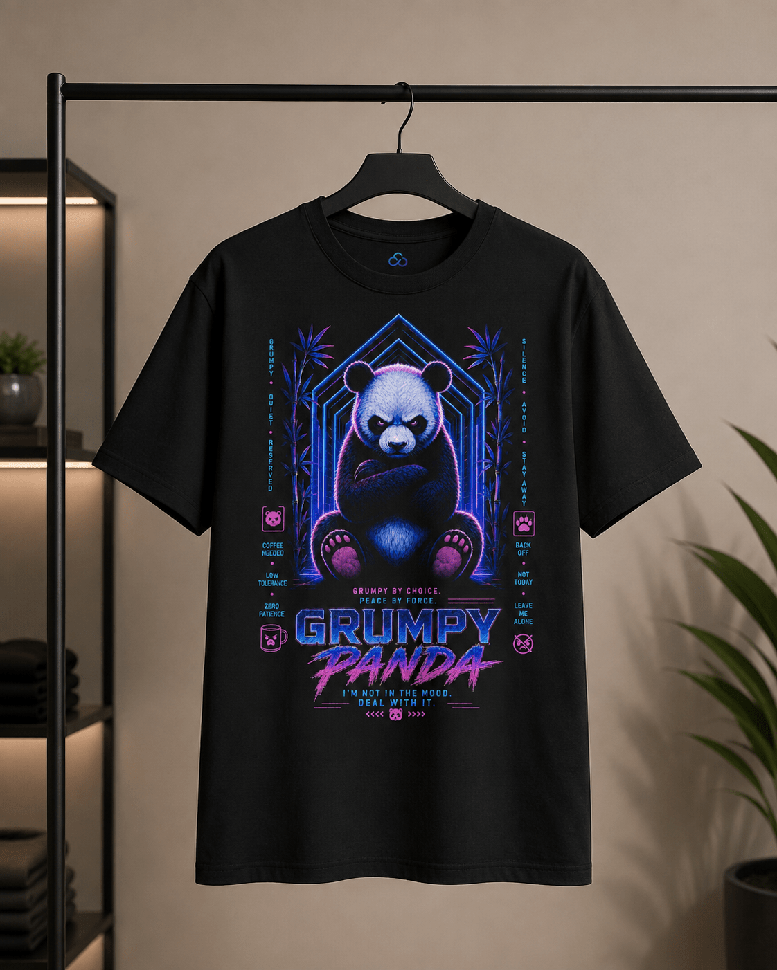Black T-shirt with neon grumpy panda front graphic, shown on a hanger