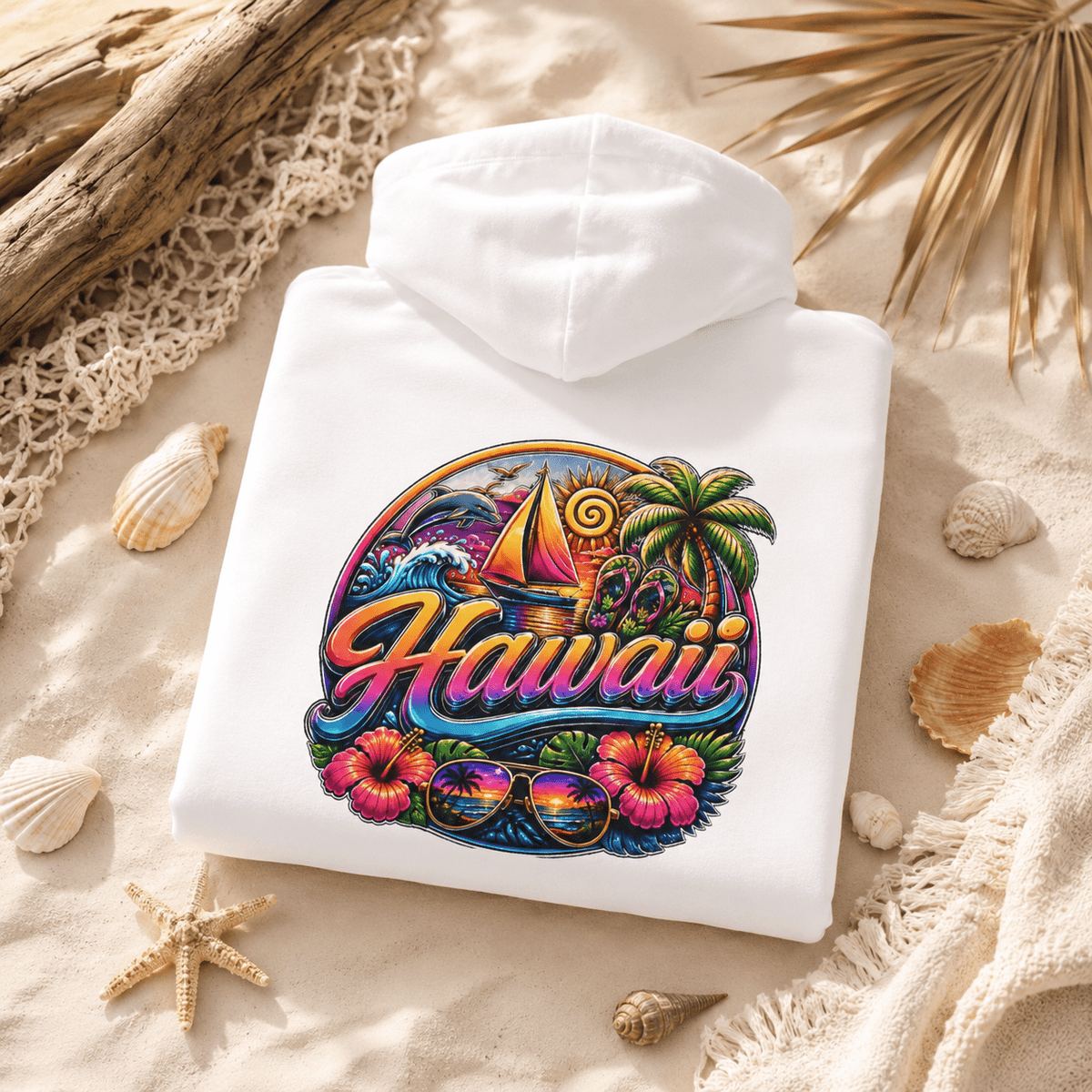 White hoodie laid flat with back graphic featuring Hawaii text and surf scene.