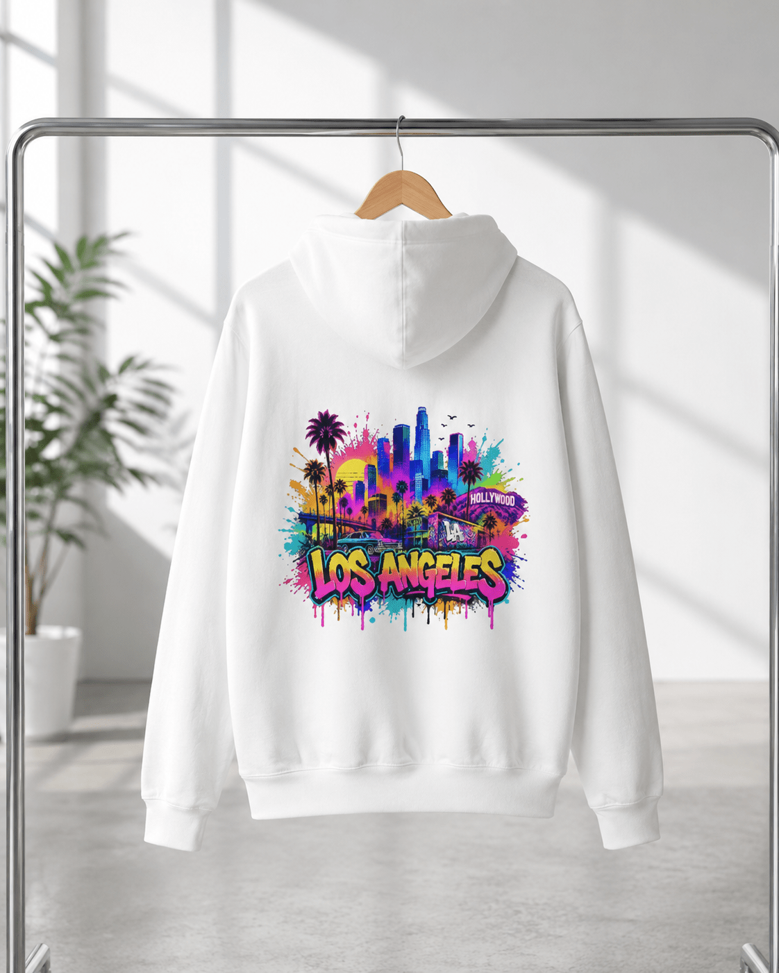 White hoodie on hanger with colorful graffiti skyline chest graphic