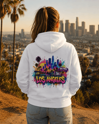 White hoodie with colorful graffiti skyline back print, worn from behind