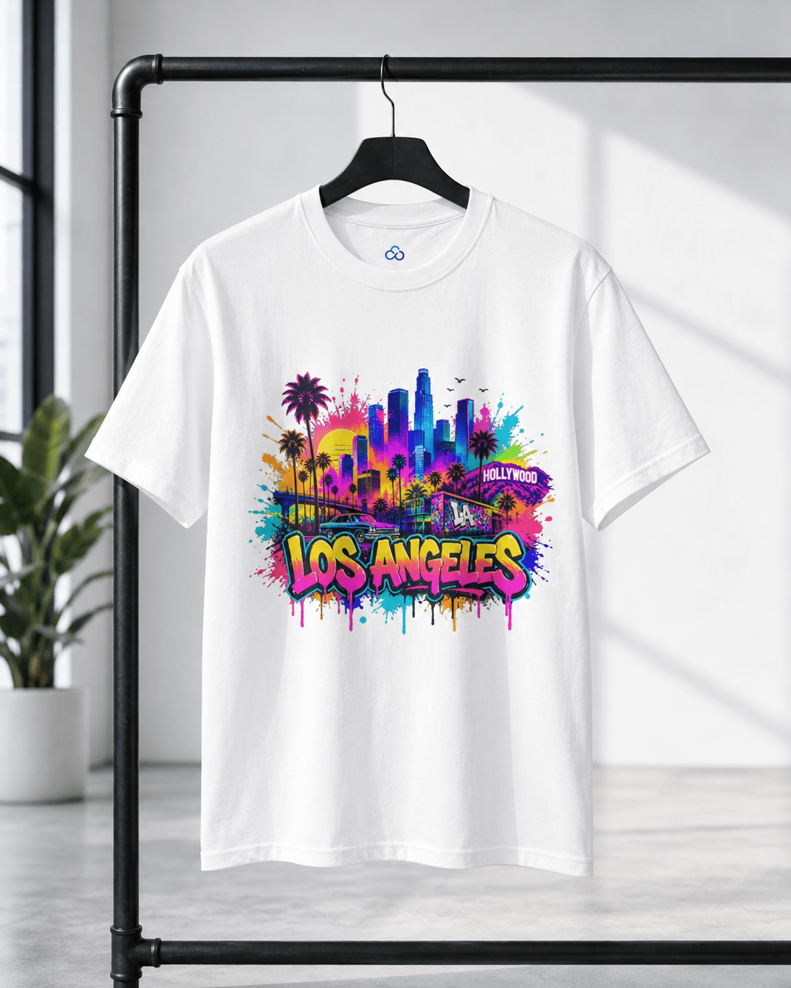 White T-shirt featuring colorful Los Angeles skyline with palm trees and “Hollywood”