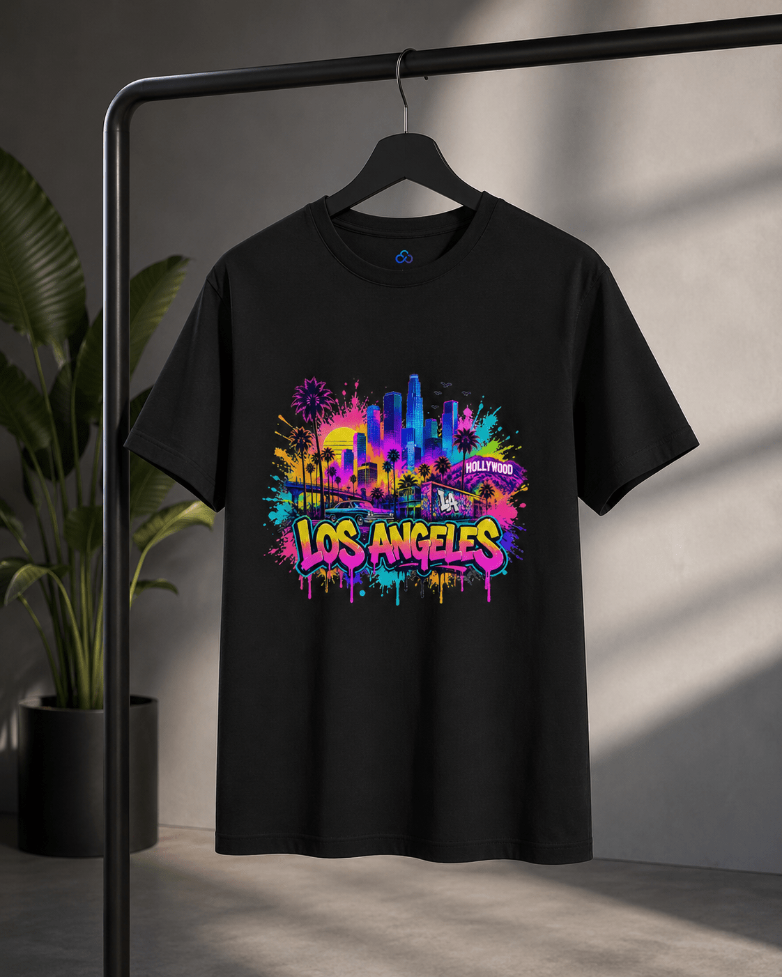 Black T-shirt with vibrant Los Angeles skyline, palm trees, and “Hollywood” graphic