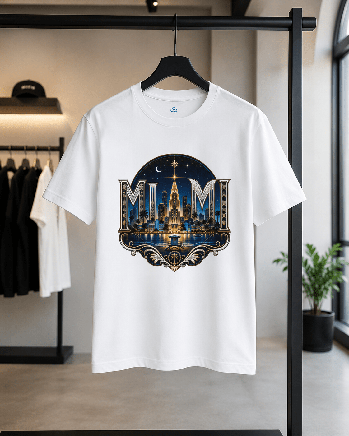 White crew-neck T-shirt with front night skyline emblem graphic, hanging on rack