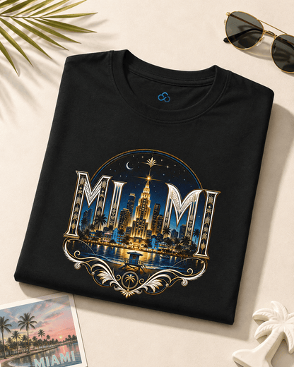Black crew-neck t-shirt folded, Miami skyline graphic with ornate border