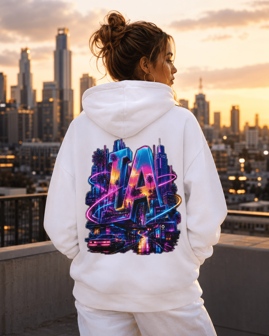 White hoodie worn by model, back view with neon LA city graphic
