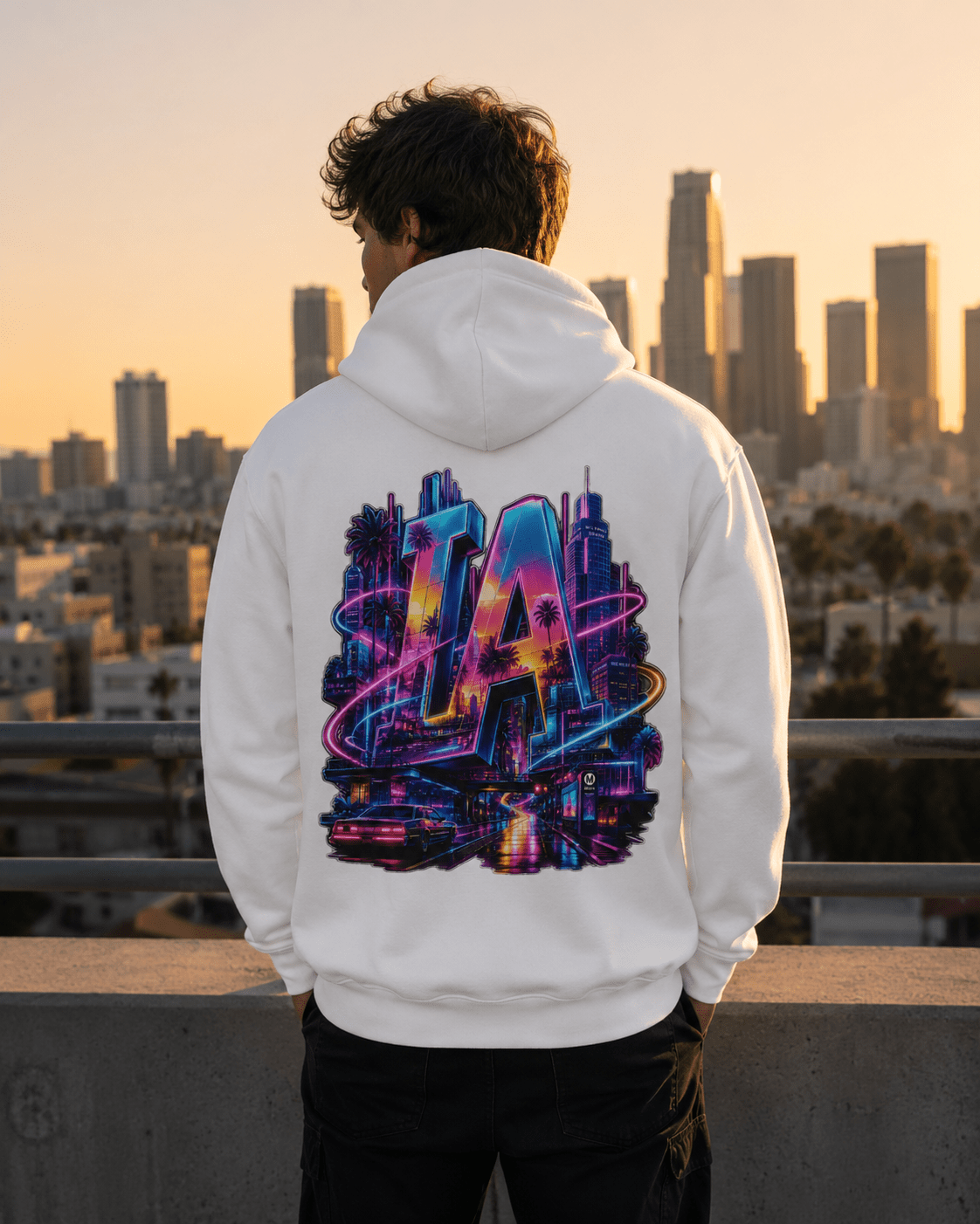 White hoodie worn by model, back neon LA city graphic over hood