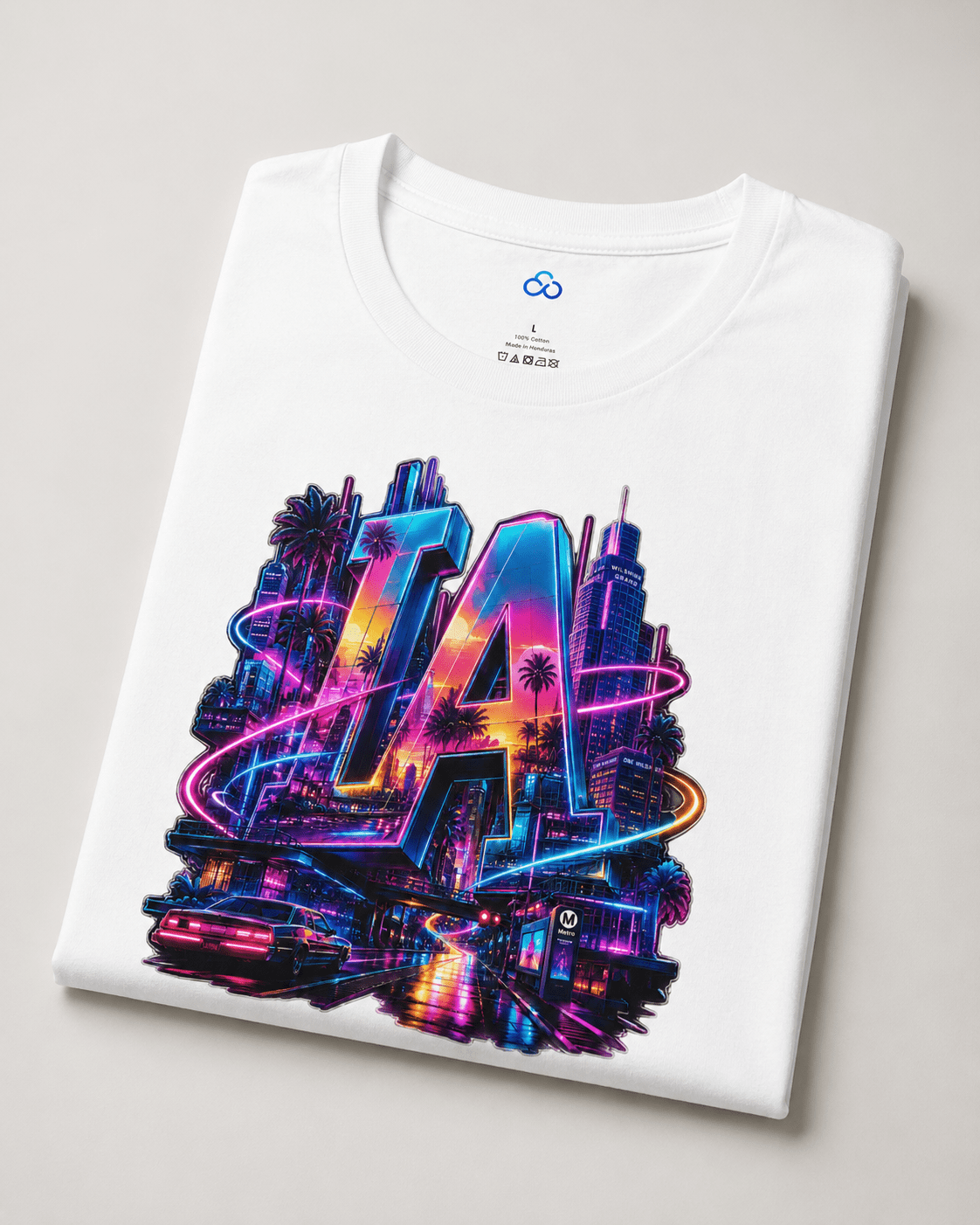 Folded white graphic T-shirt with colorful neon LA letters and skyline print