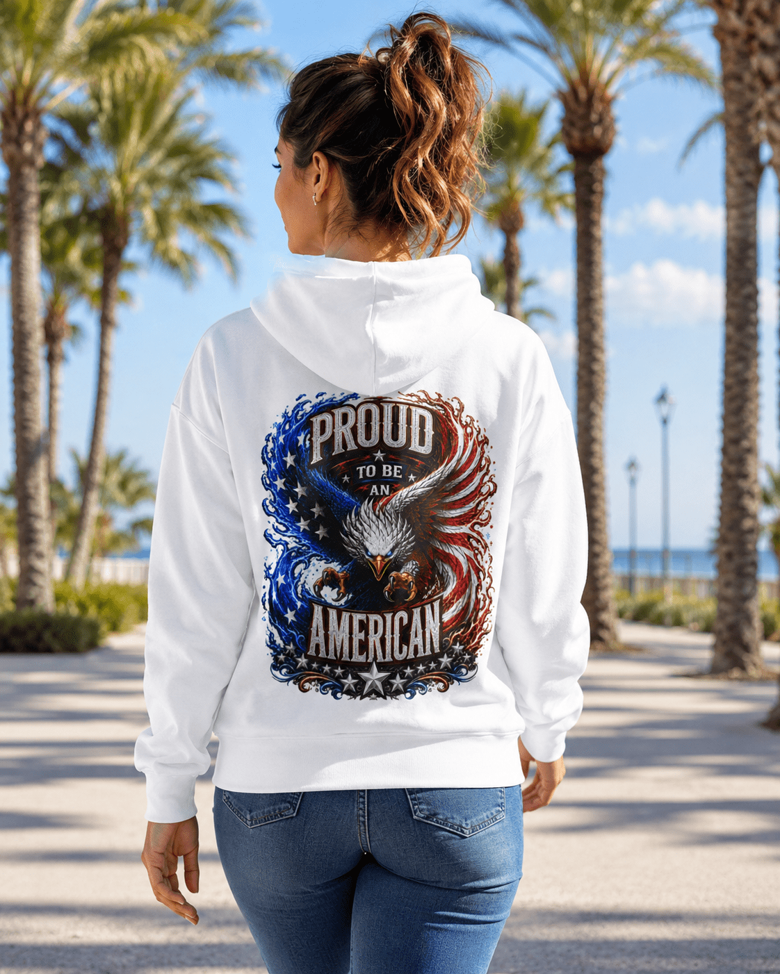 White hoodie worn, back view; Proud American eagle graphic with stars and ribbon