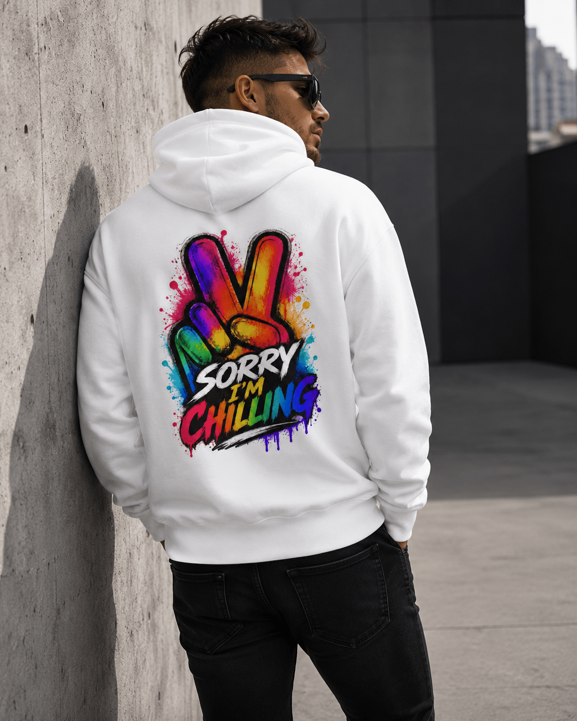 White hoodie back view with Sorry I'm Chilling colorful graphic and hood