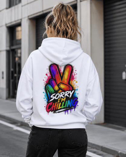 White hoodie worn from the back with Sorry I'm Chilling colorful graphic