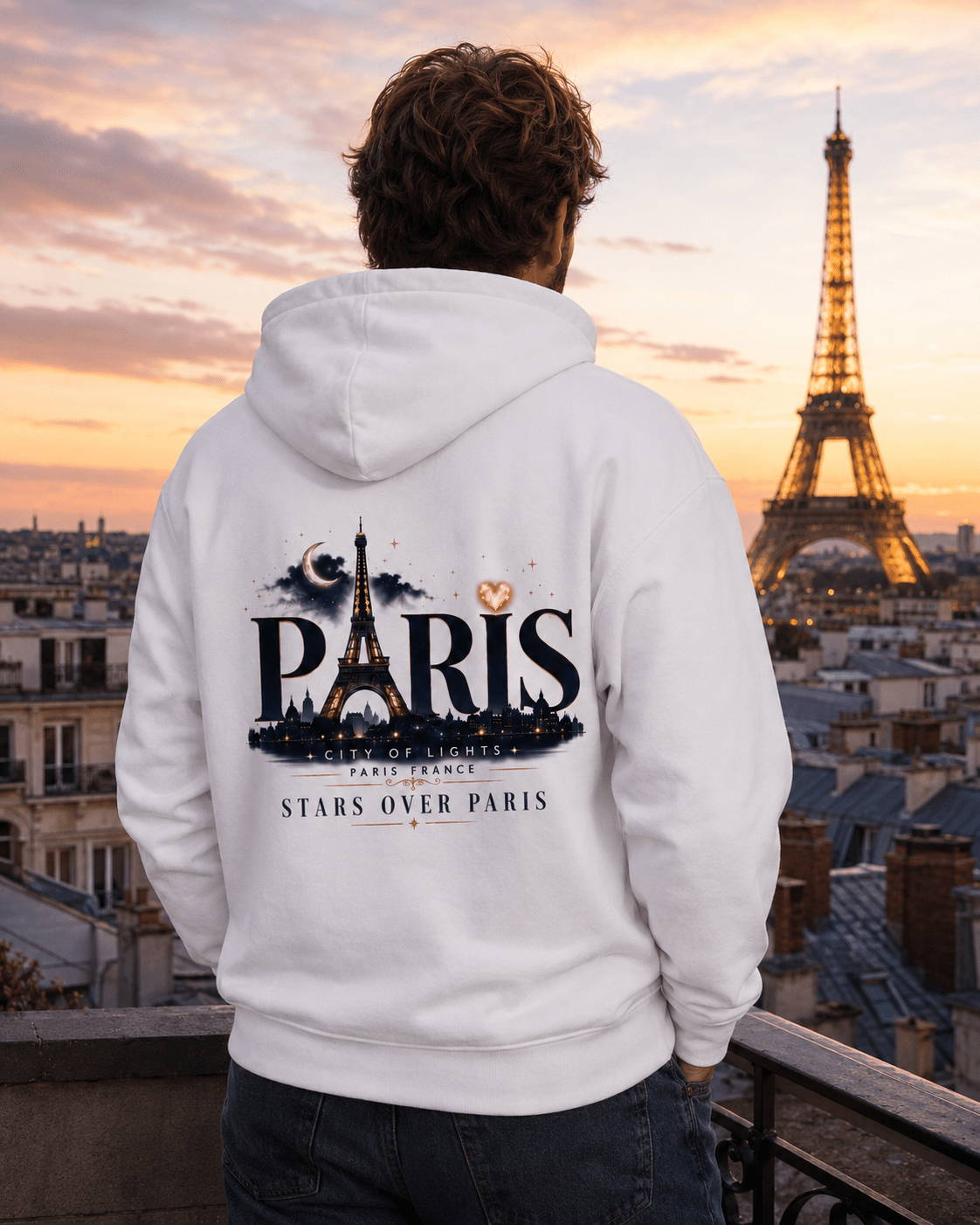 White hoodie back graphic with Paris skyline, Eiffel Tower, and stars