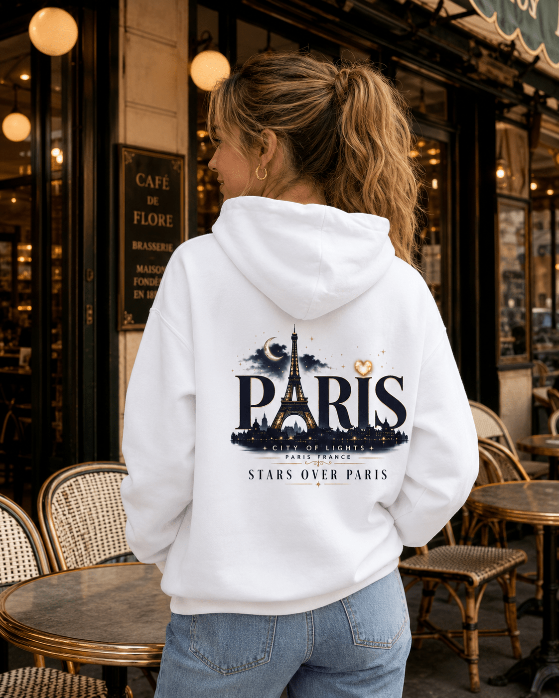 White hoodie back view with Paris graphic, Eiffel Tower, and star design
