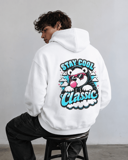 White hoodie with bear graphic and 'Stay Cool Classic' text on back, standing