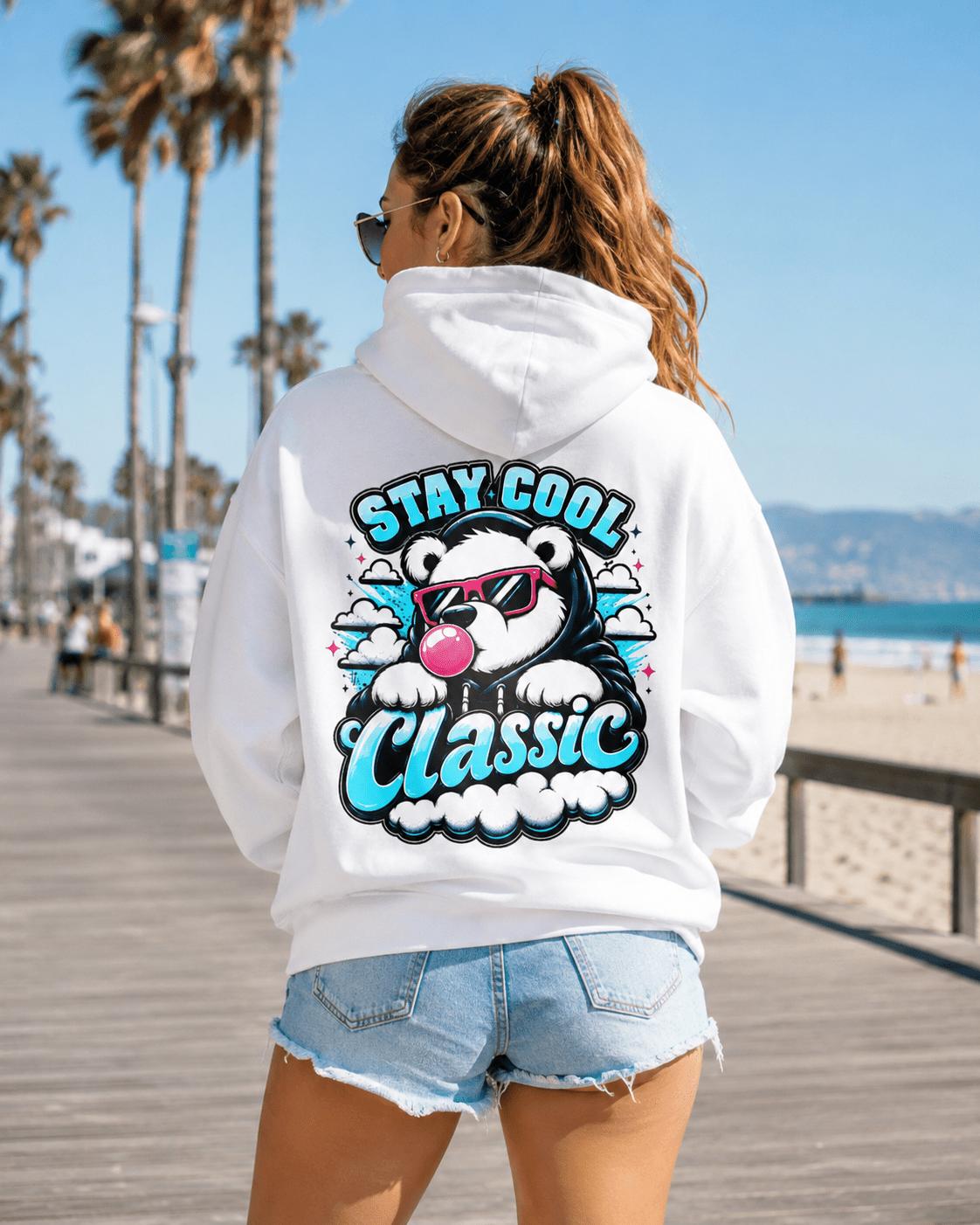 White hoodie with bear graphic and 'Stay Cool Classic' text on back, back view