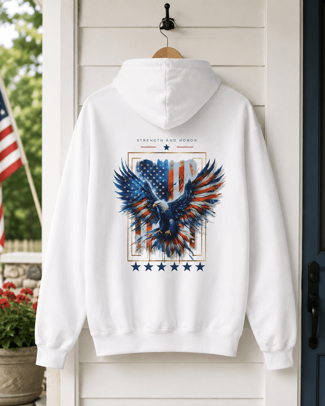 White hoodie hanging, centered back eagle and stars graphic with star row at bottom
