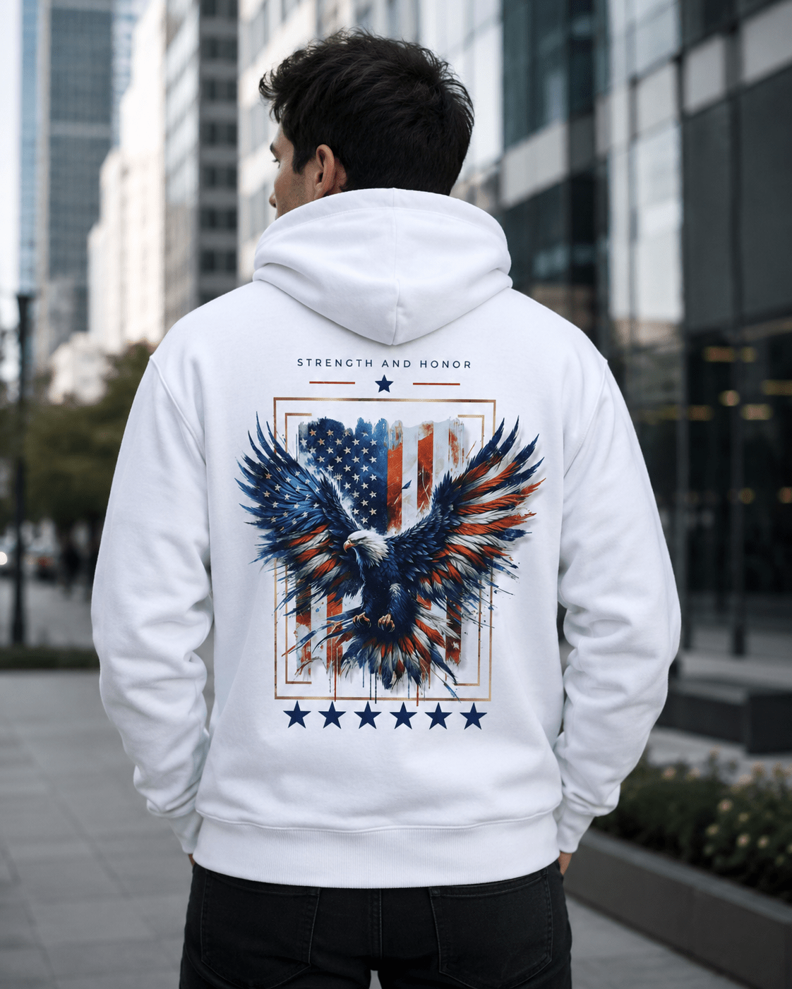 White hoodie worn by man, back eagle and stars print centered with star row below