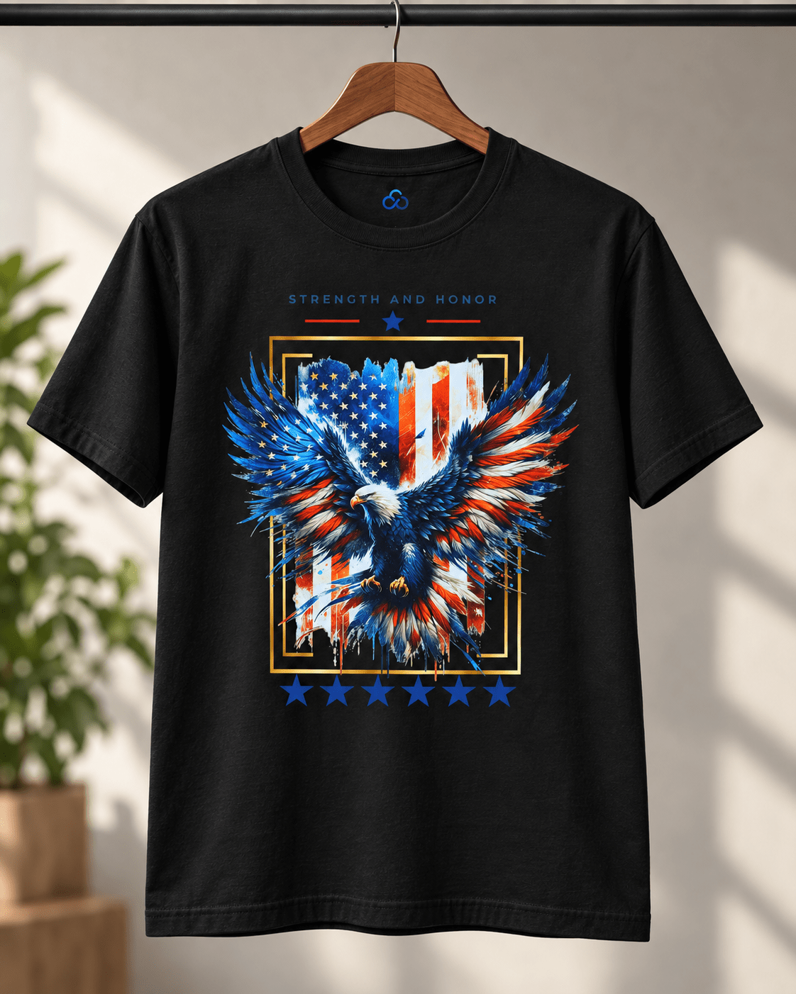 Black T-shirt hanging up front: blue-red eagle graphic with stars and rectangular border.