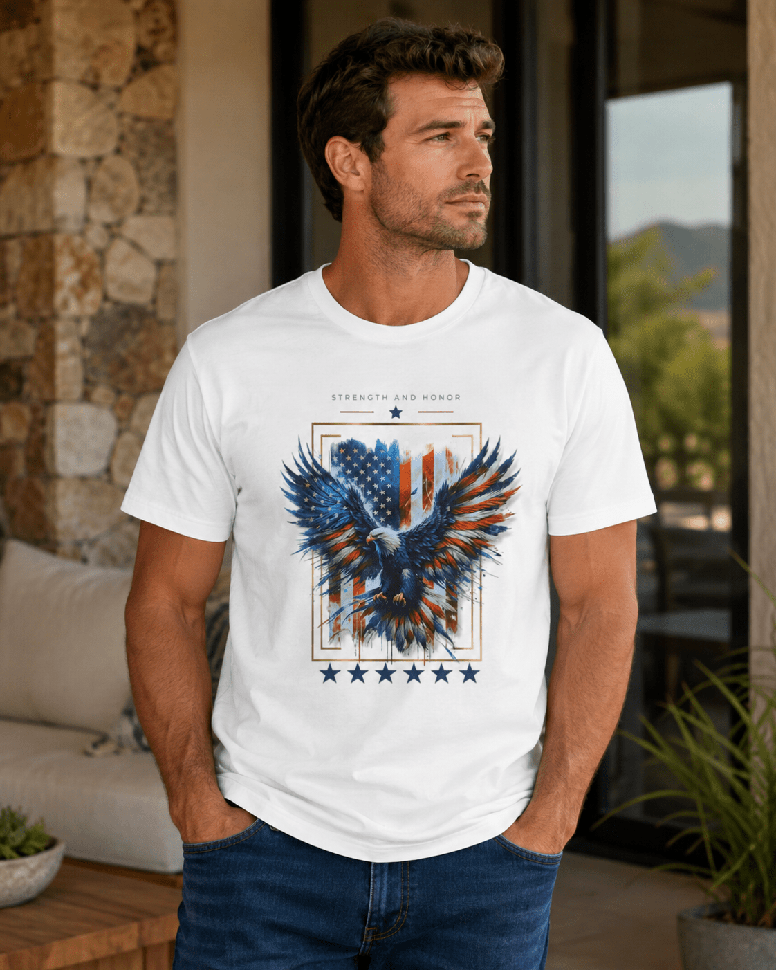 White T-shirt on model with blue-red eagle graphic and star row beneath the artwork.