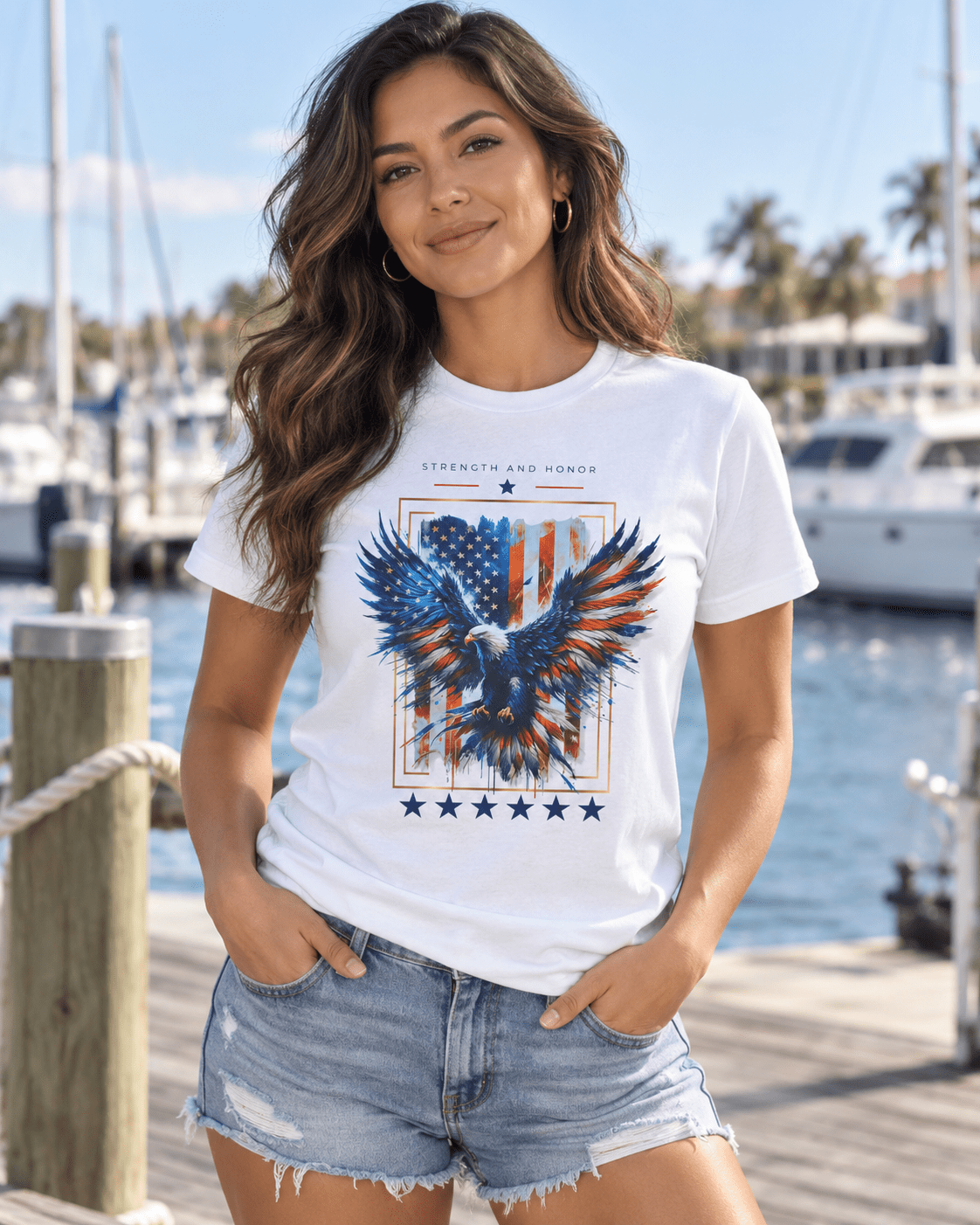 White T-shirt worn by model, featuring a blue-red eagle graphic with stars at the bottom.