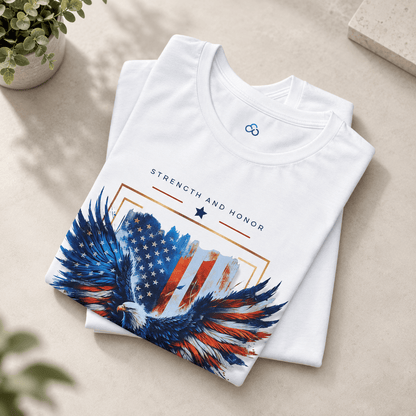 Folded white T-shirt with blue-red eagle graphic, framed stars, and small crest above.