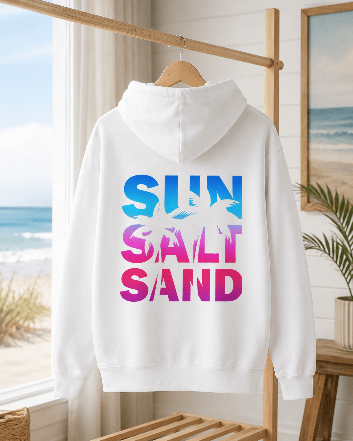 White pullover hoodie with 'SUN SALT SAND' back graphic, hood up