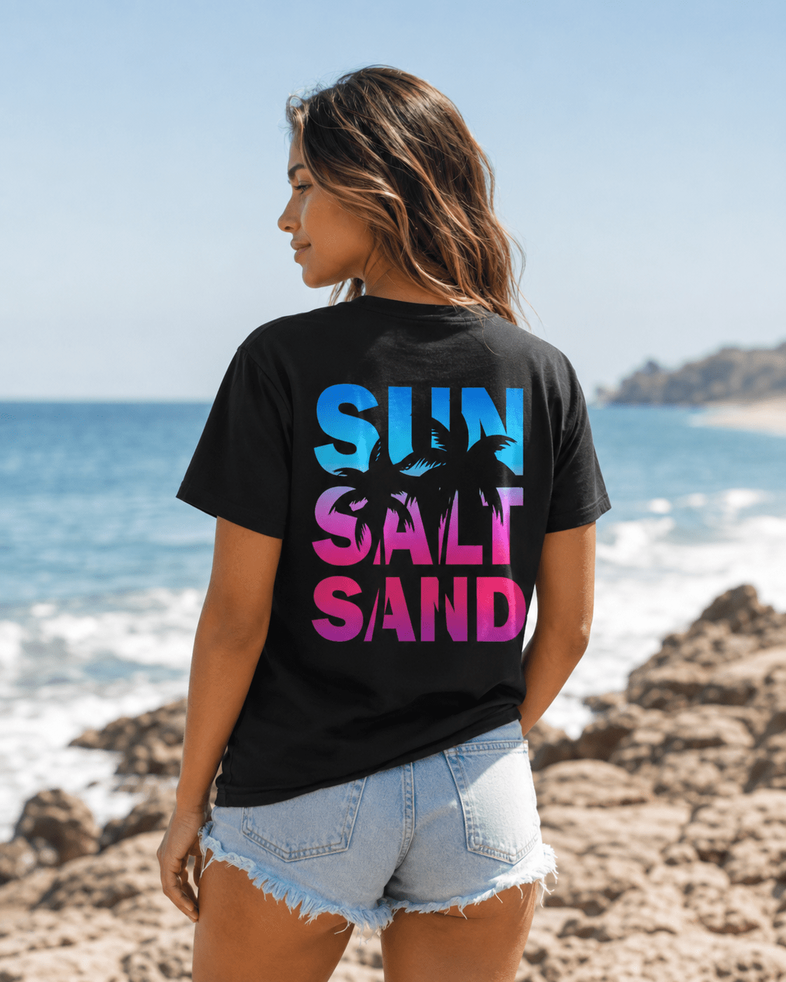 Black crew-neck T-shirt with back graphic reading "SUN SALT SAND" and palms