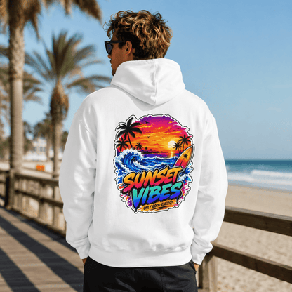 White pullover hoodie with back sunset graphic, worn outdoors by the ocean