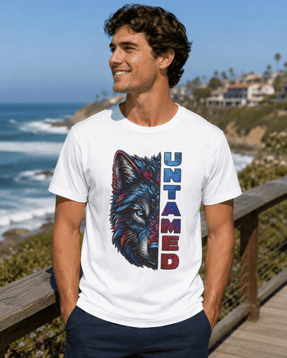 White Untamed T-shirt worn by a man, featuring a colorful wolf and vertical 'UNTAMED' text