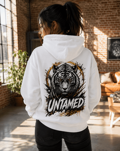 White tiger graphic hoodie on person, back print with UNTAMED text and hood