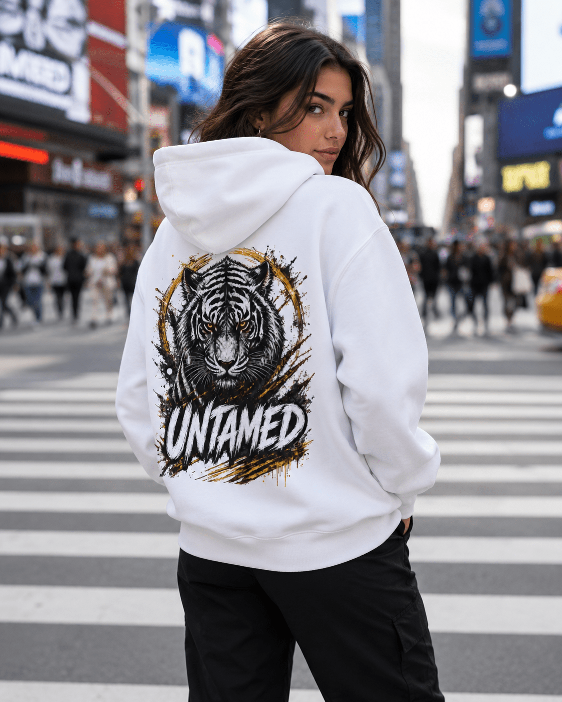 White tiger graphic hoodie, back on woman with UNTAMED tiger print