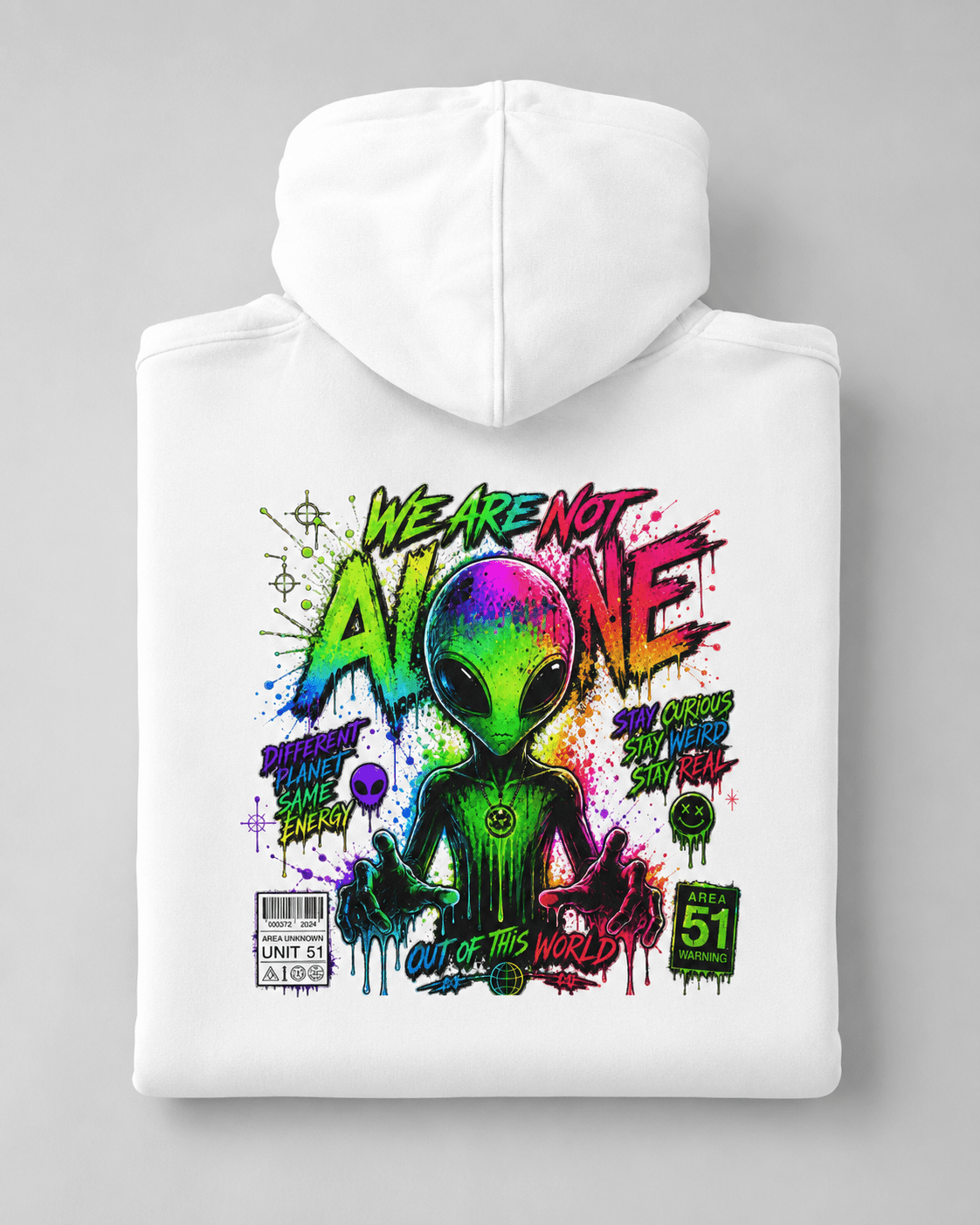 White pullover hoodie, hood up, with colorful alien artwork printed on the back
