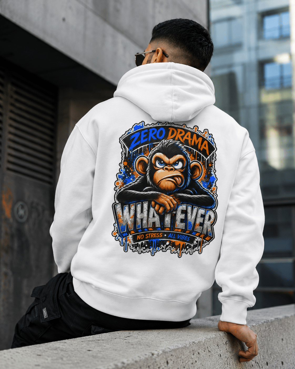 White hoodie, back view, colorful cartoon monkey graphic with 'WHAT-EVER' text
